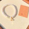 Vòng tay charm ngọc trai thiên nhiên mix hạt ngọc bích